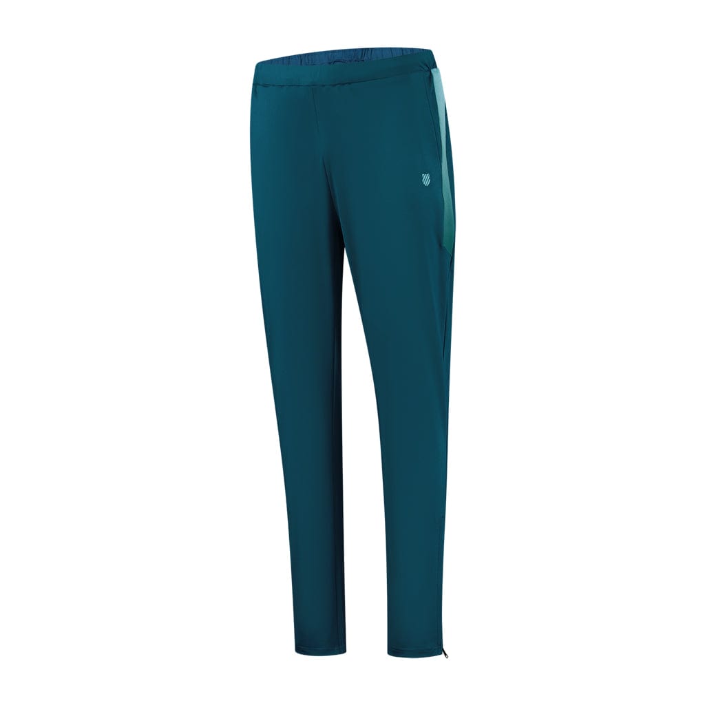 The K-Swiss Tac Hypercourt Tennis Tracksuit Pants 5 in Blue Opal boast an elastic waistband, a small logo on the side, and a slim fit design. These tracksuit pants from the K-Swiss brand feature side stripes and subtle stitching detail along the legs.