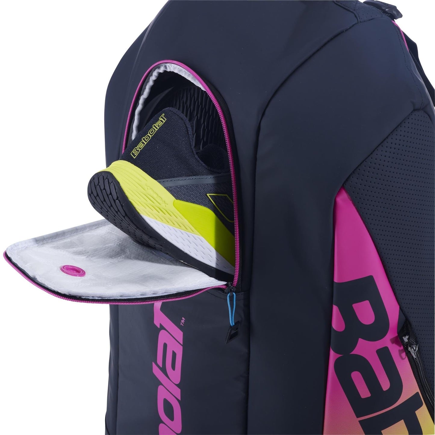A black and pink tennis bag unzipped on the side to reveal a pair of black and yellow sneakers inside. The Babolat RH6 Pure Aero Rafa II Tennis Bag branding is visible on the bag, making it perfect for advanced players.