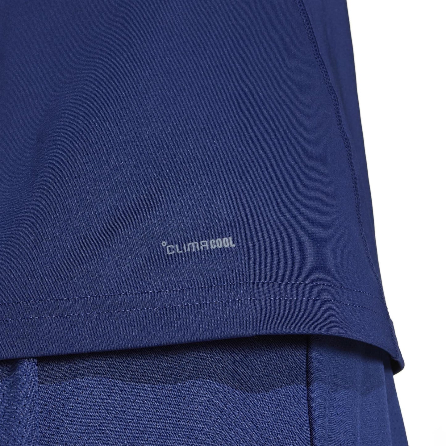 Close-up of a navy sports shirt with the "Climacool" logo, showcasing the textured, breathable design of the adidas Women's Club Tennis Tank Top, with a recycled-material hemline.