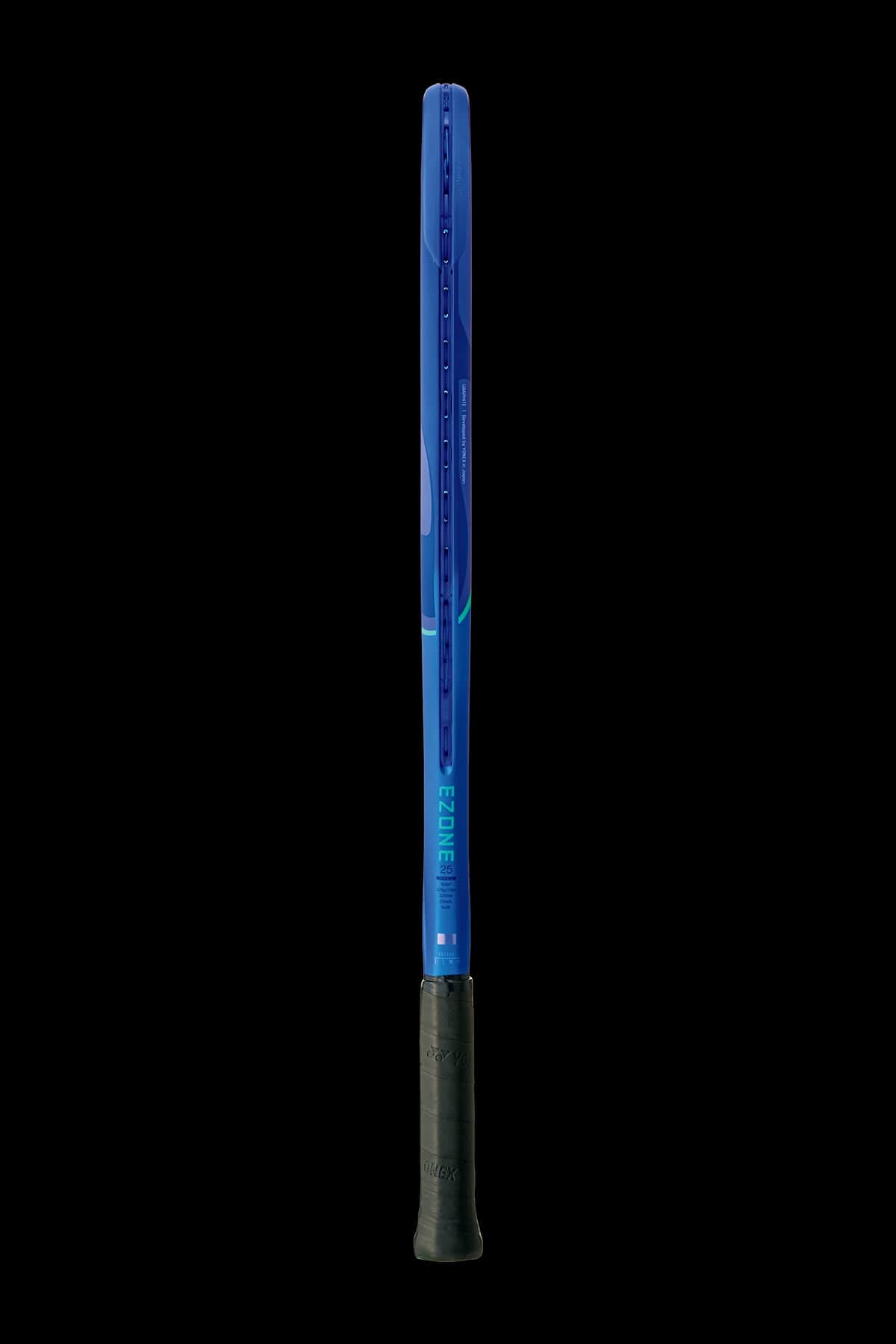 The Yonex EZONE 25 Junior Graphite 2025 Tennis Racket in Blast Blue, with a black grip, stands out against a dark backdrop. Its isometric frame offers uniqueness, and the textured handle ensures a secure grip. The hidden strings highlight its sleek design.