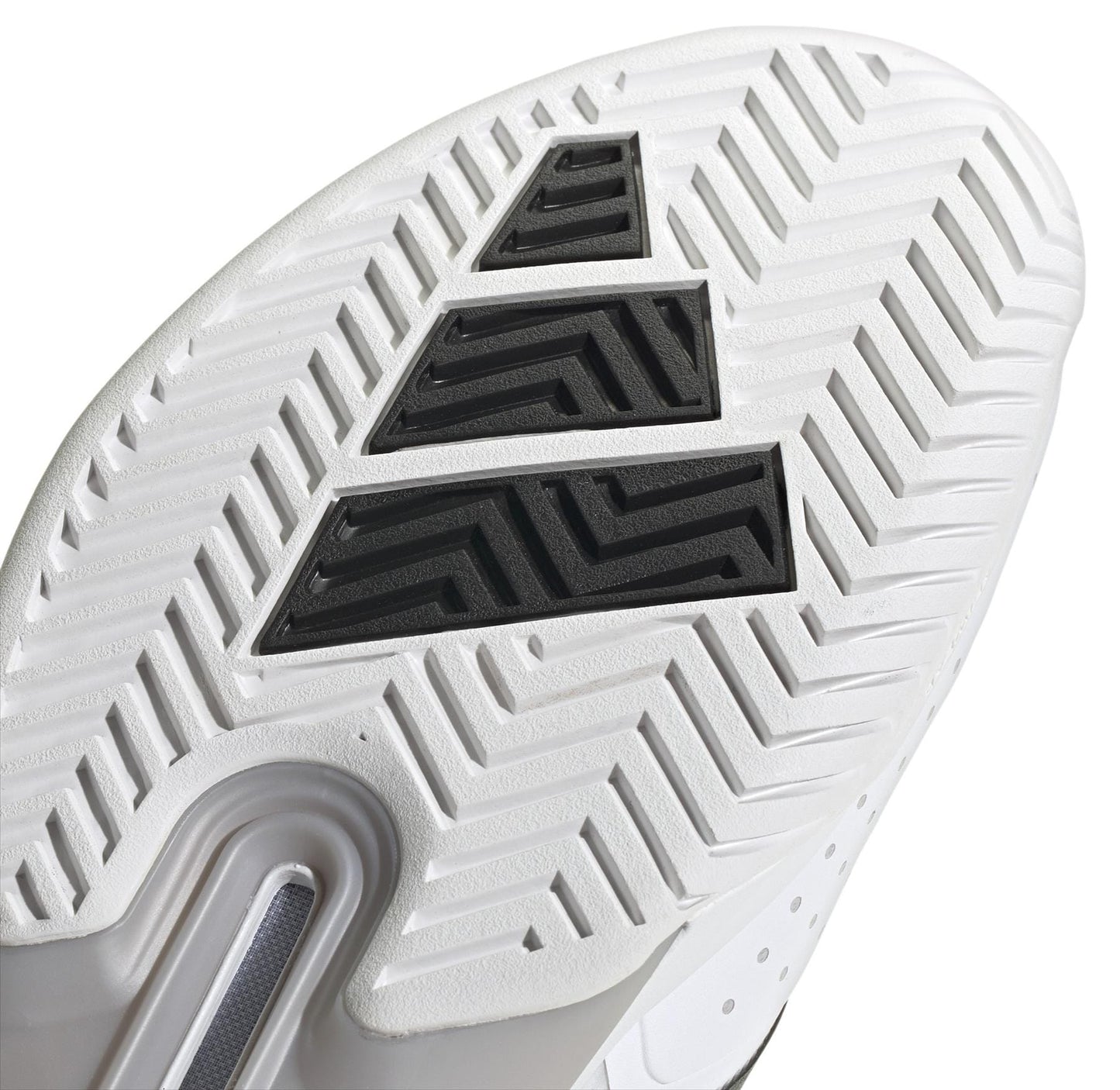 Close-up of the white ADIDAS Adizero Ubersonic 5 men's tennis shoe sole with a zigzag tread and three black stripes, highlighting adidas's unique style. The Speedframe outsole provides a textured surface for excellent grip and traction.