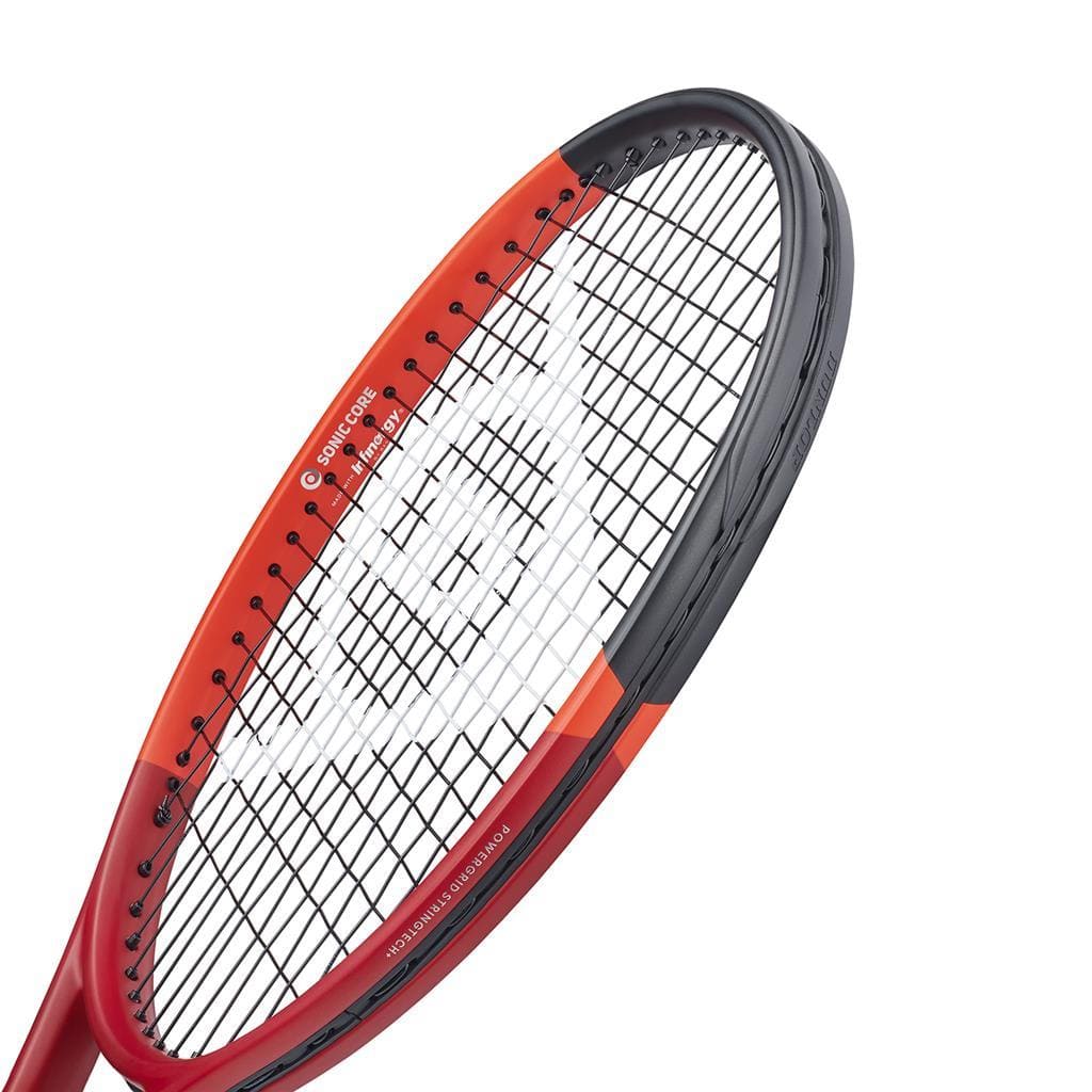 A close-up of the Dunlop CX 400 2024 Tennis Racket in red highlights its black and red frame, featuring Powergrid Stringtech. The strings create a grid pattern with the Dunlop logo prominently displayed. Enhanced with Vibroshield technology, the racket's angled design underscores its advanced performance capabilities.