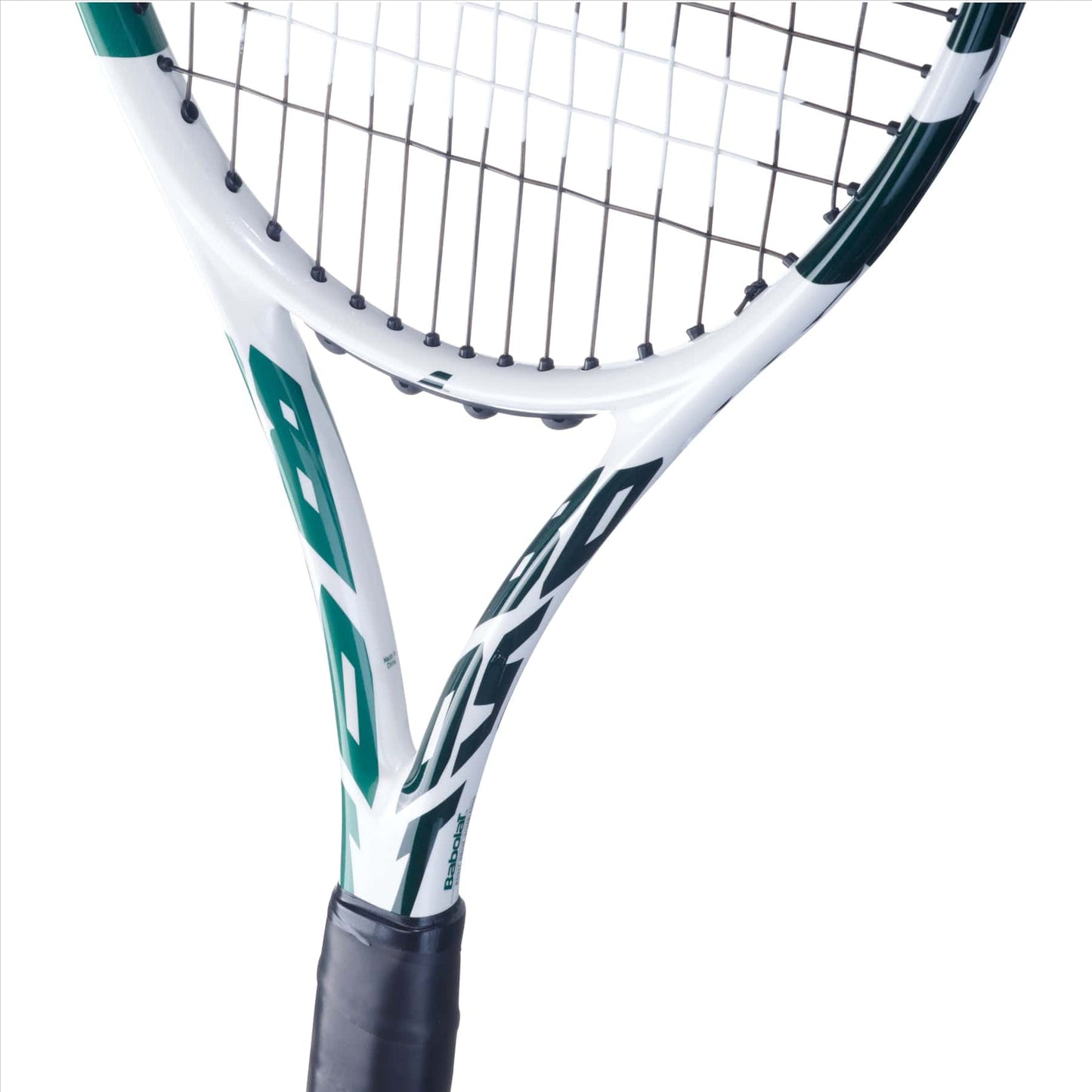 A close-up view of the Babolat Boost Drive Wimbledon tennis racket, featuring a sleek white frame with green accents and prominently displaying the Babolat logo. The strings are clearly visible, and the handle is wrapped in black grip tape, set against a plain white background.