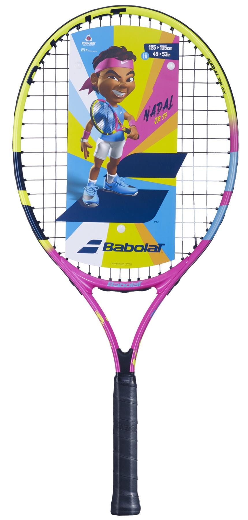 A vibrant Babolat tennis racket designed for children, showcasing a playful pink, yellow, and purple pattern. The lightweight Nadal Junior 23 racket features an illustration of a cartoon tennis player and includes the text "Nadal Jr 25," with its handle wrapped in black grip tape.