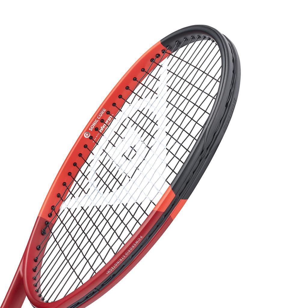 Close-up of a Dunlop CX 200 2024 Tennis Racket featuring a red and black frame. The strings form a pattern, showcasing impressive spin potential, with the white Dunlop logo visible near the center. Subtle brand and model details are printed along the frame.