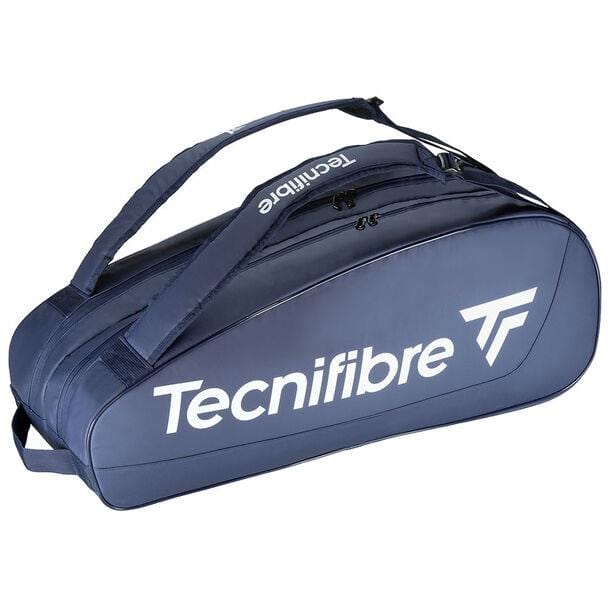The Navy Blue Tecnifibre Tour Endurance 2023 9 Racket Tennis Bag displays a white logo. Made with robust tarpaulin fabric, it offers several compartments and includes a comfortable shoulder strap for easy carrying.