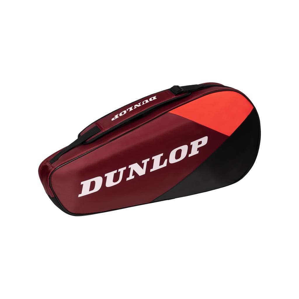 The Dunlop CX Club 3 Tennis Racket Bag in black and red is ideal for transporting your rackets. It showcases a prominent white logo on the side and features a lightweight design with a zipper closure, top handles, and padded backpack straps for easy carrying.