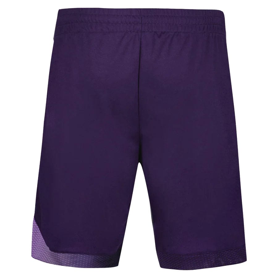 Introducing the Le Coq Sportif Pro Men's Tennis Shorts in Purple Velvet. These shorts feature a sophisticated dark purple hue, accented with a delicate lighter purple trim near the hem, as seen from the back. Constructed from breathable material, they include an elastic waistband and are crafted to enhance mobility, whether you're engaging in sports or enjoying casual wear.