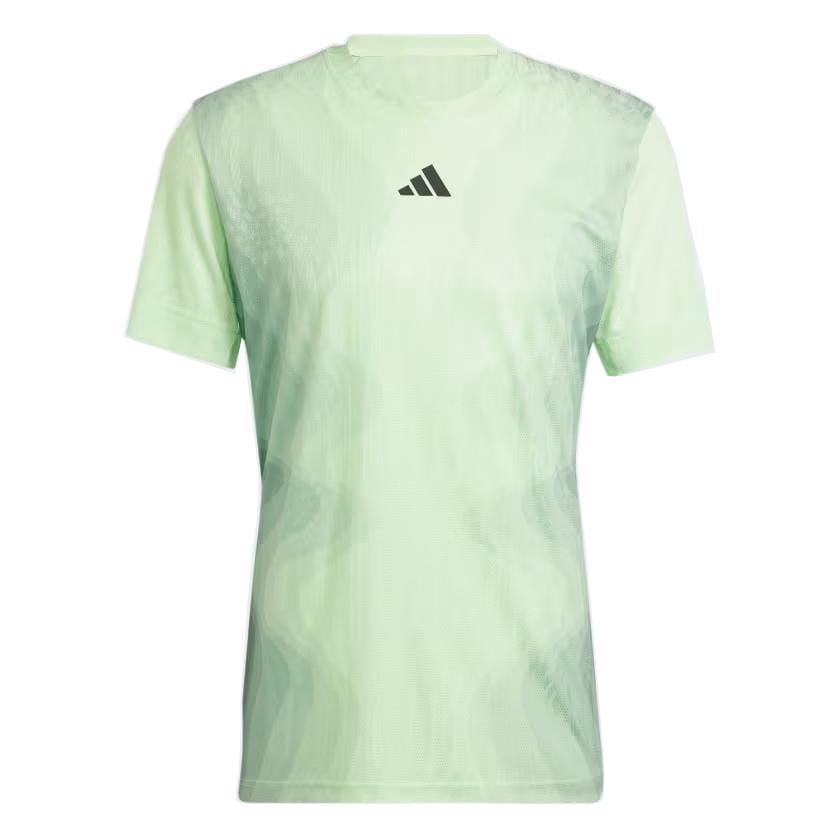 The adidas Melbourne Men's Pro Tennis T-Shirt in green showcases a subtle pattern and a small logo on the chest. Made from recycled polyester with HEAT.RDY technology, it features a round neckline and short sleeves for superb comfort.