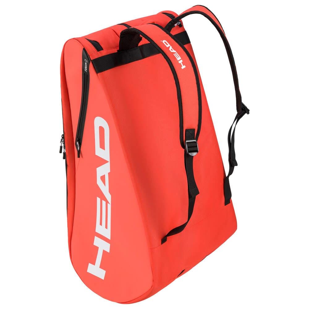 A fluorescent orange HEAD Tour Tennis Racket Bag XL with black straps and "HEAD" in white on the side. The bag includes a backpack carry system, zippered compartments, and a top handle. Its sleek and athletic design makes it perfect for players on the go.