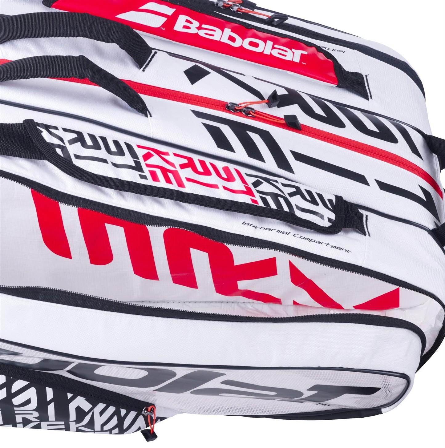 A close-up of the Babolat RH12 Pure Strike 12 Racket Tennis Bag reveals a stylish and insulated storage solution for tennis equipment. This sleek white, black, and red bag features several compartments, zippers, bold branding in black and red text, along with angular patterns that contribute to its compact look.