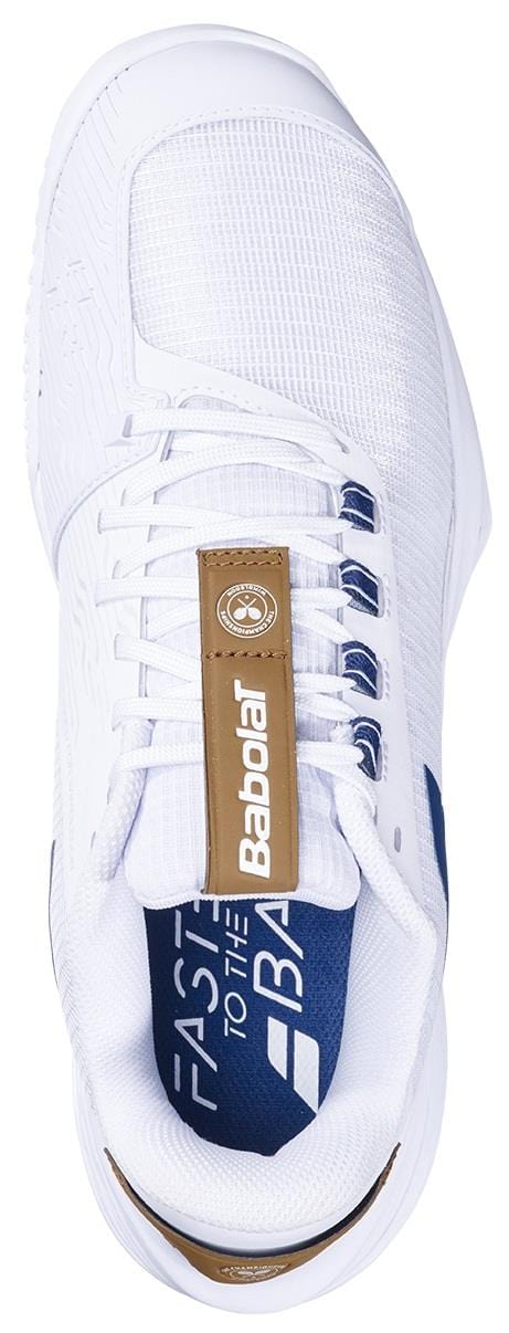 Top view of the Babolat Jet Tere 2 Wimbledon Sand Grass 2025 Men's Tennis Shoes in white/blue, ultra-lightweight with "Babolat" branding on tongue and insole, blue and brown accents, and white laces for optimal comfort.