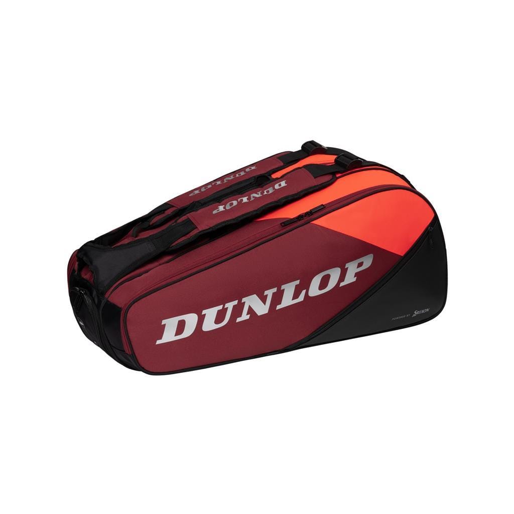 The Dunlop CX Performance 8 Tennis Racket Bag in black and red showcases multiple compartments and prominently displays the Dunlop logo. Its sleek design includes convenient zippers for storage and ergonomic shoulder straps, combining style with comfort while you're on the move.