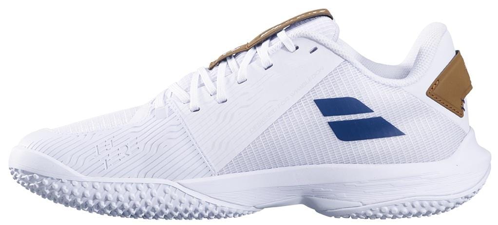 The Babolat Jet Tere 2 Wimbledon Sand Grass 2025 Men's Tennis Shoe features a white ultra-lightweight design with textured sole, blue side logo, white laces, and brown heel accent, shown in side profile.