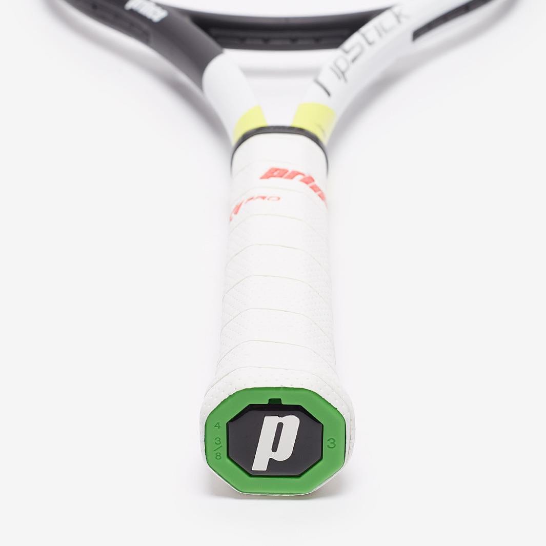 Close-up view of a Prince Ripstick 100 300g Tennis Racket handle, adorned with a white grip and a green hexagonal end cap showcasing the "P" logo. The partially visible frame above, in striking black, red, and yellow colors, features the TeXtreme design for increased power. The perspective emphasizes the handle's branding and craftsmanship from Prince.