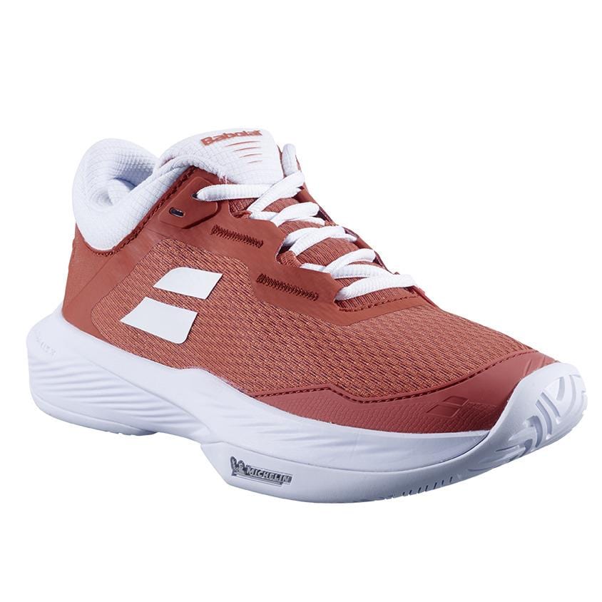 The Babolat SFX 4 Women's Tennis Shoes in Terra Cotta feature a breathable mesh upper, white laces, white accents, a white sole, and branded details on the side and tongue for comfort and style.