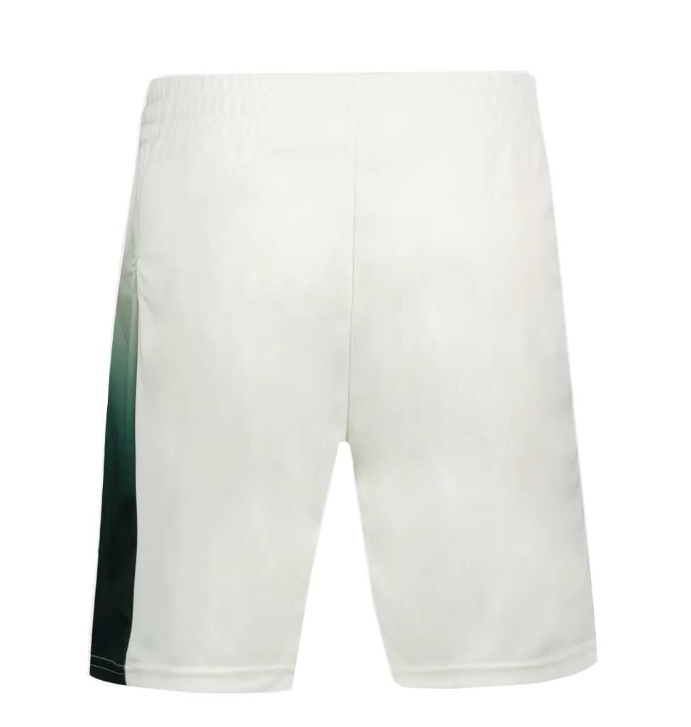 Le Coq Sportif Pro Mens Tennis Shorts in Marshmallow, shown from the back, feature a green and black gradient stripe on the left—ideal for tennis players who value breathable comfort.