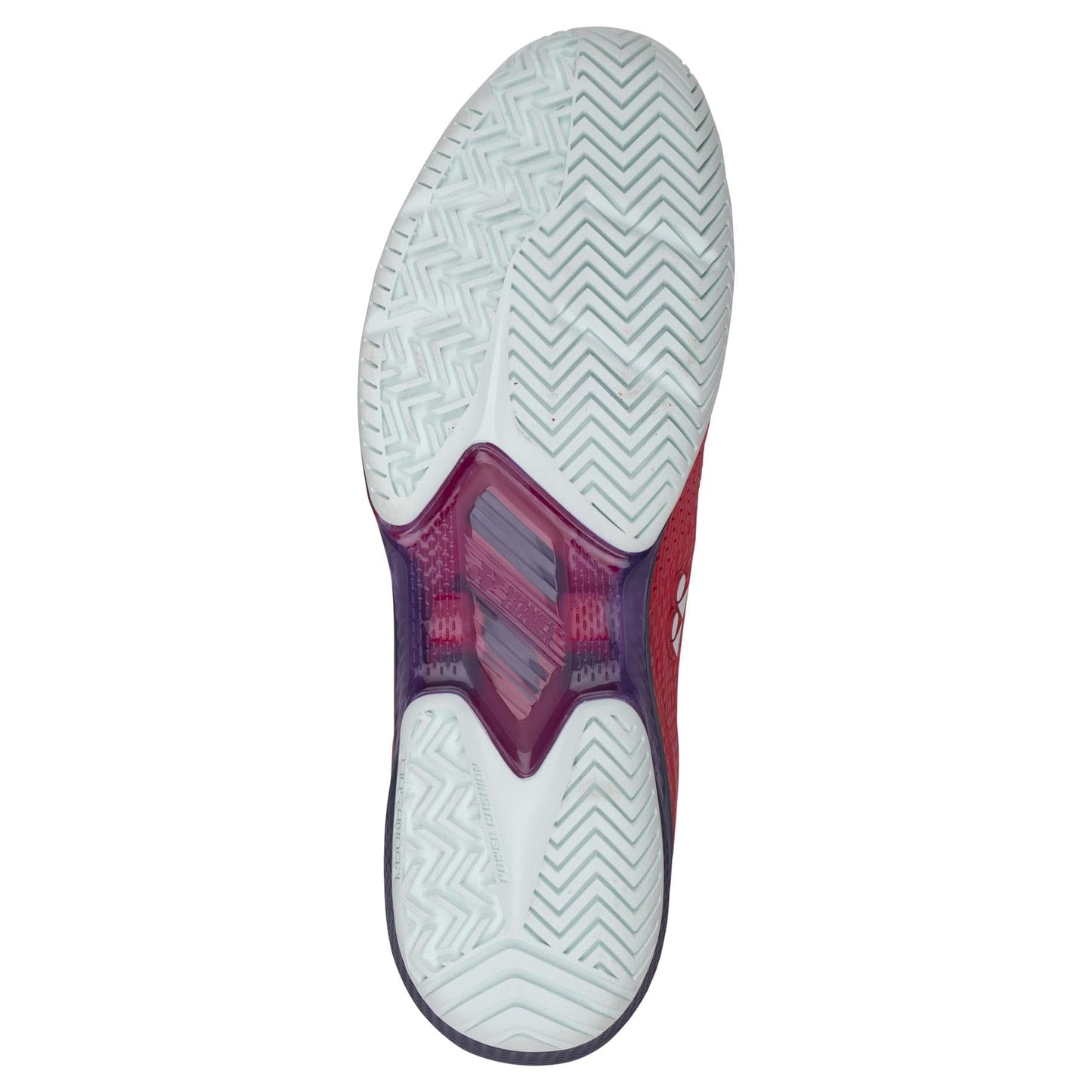 The image showcases the sole of the Yonex Power Cushion Ad-Accel Men's Tennis Shoes in Sunset Red, featuring a zigzag tread pattern enhanced with Accel-Booster technology. The midsole is highlighted in a purple shade, while the rest of the shoe boasts an eye-catching blend of white and red.