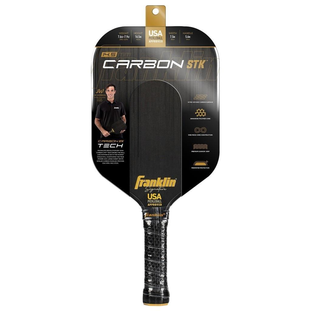 The Franklin Carbon STK 14.5mm Pickleball Paddle - Black by Franklin comes in black packaging with product info, graphics, and the yellow Franklin logo. A man holding this USA Pickleball approved paddle is pictured on the left side.
