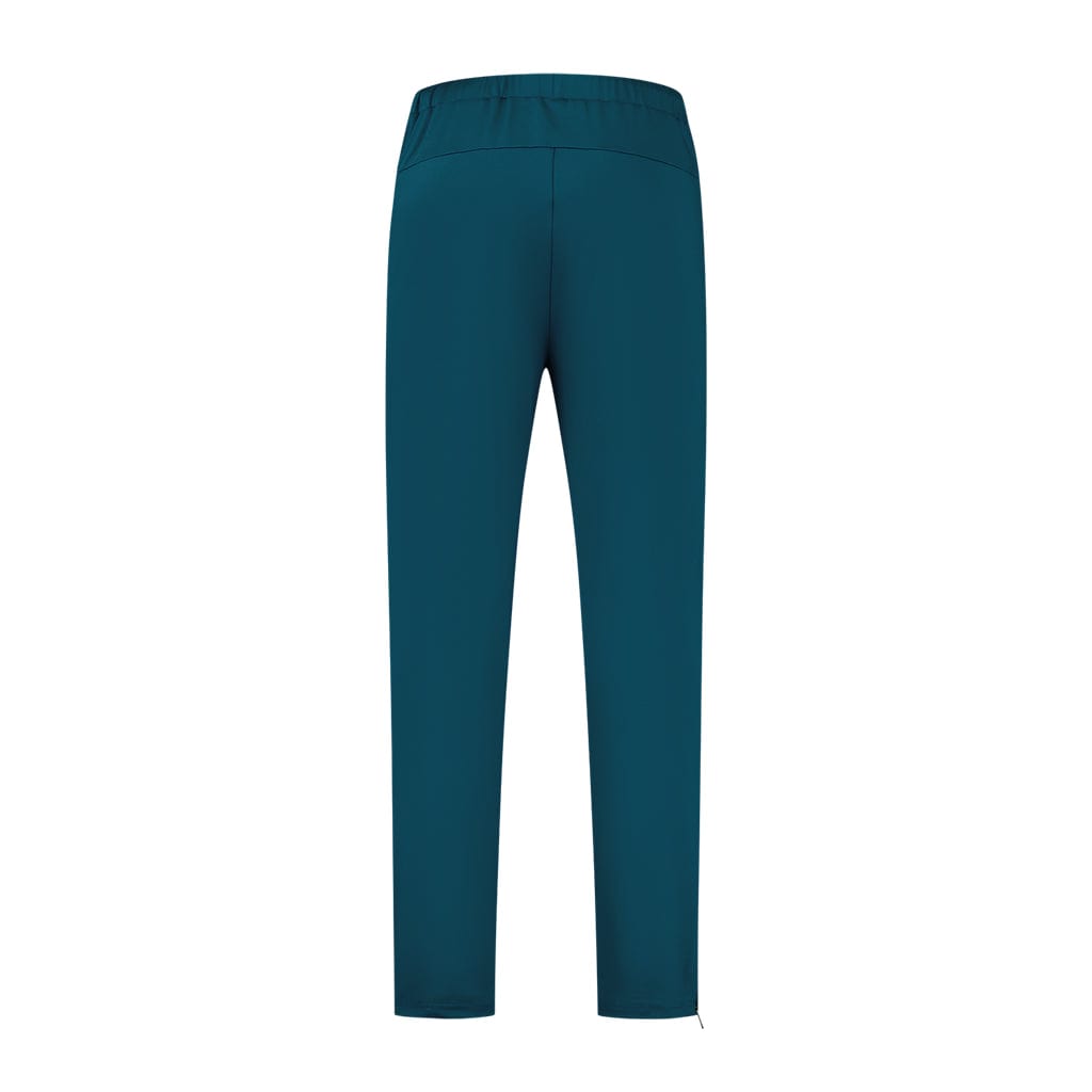 Back view of K-Swiss Tac Hypercourt Tennis Tracksuit Pants 5 in Blue Opal featuring an elastic waistband, elegantly displayed on a plain white background. As part of the Hypercourt collection, these pants boast a sleek slim fit design perfect for athletic performance and style.