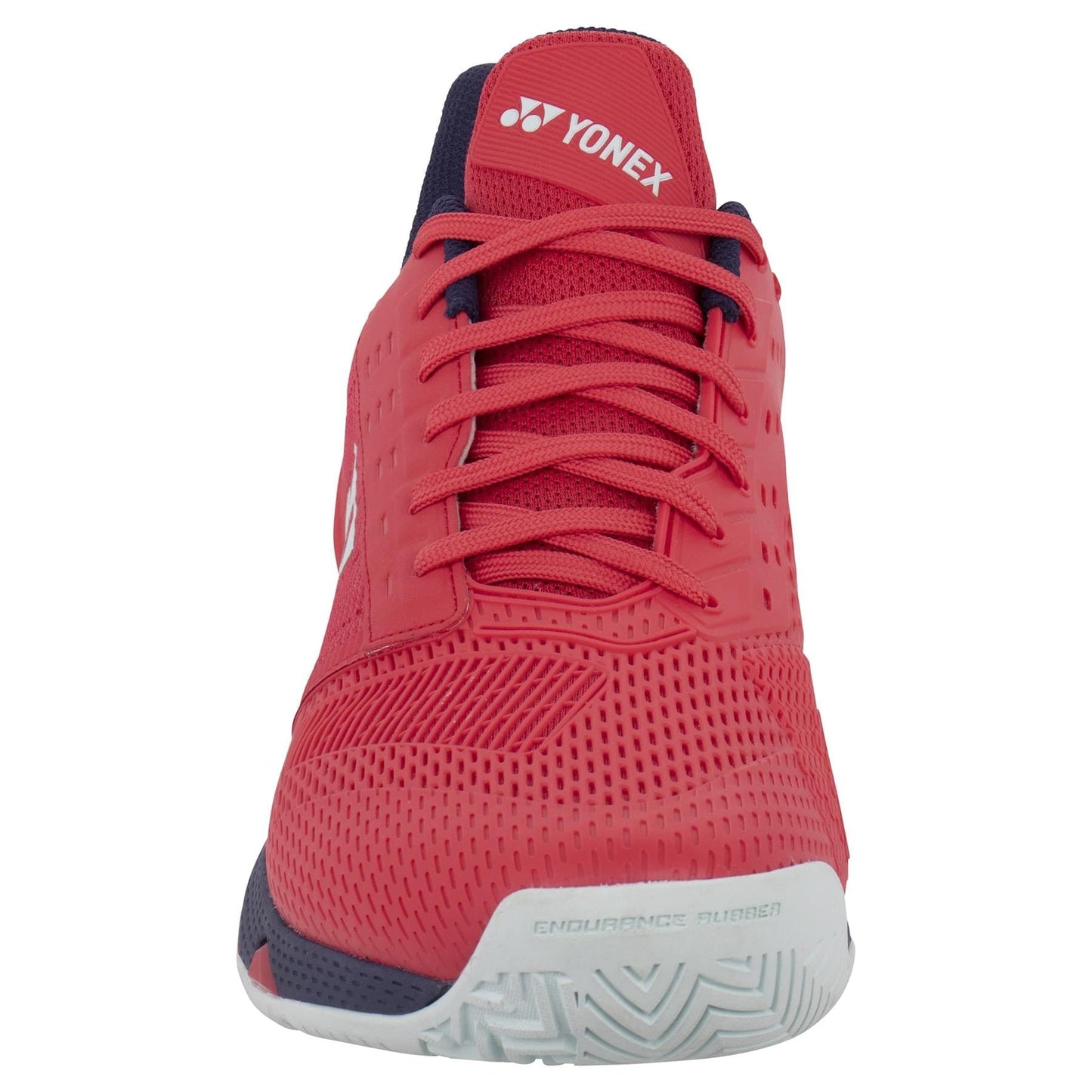 Front view of a Yonex Power Cushion Ad-Accel men's tennis shoe in sunset red with black accents and a white sole. It features vents for breathability, "Endurance Rubber" text on the sole, and incorporates Accel-Booster technology, crafted for peak sports performance.
