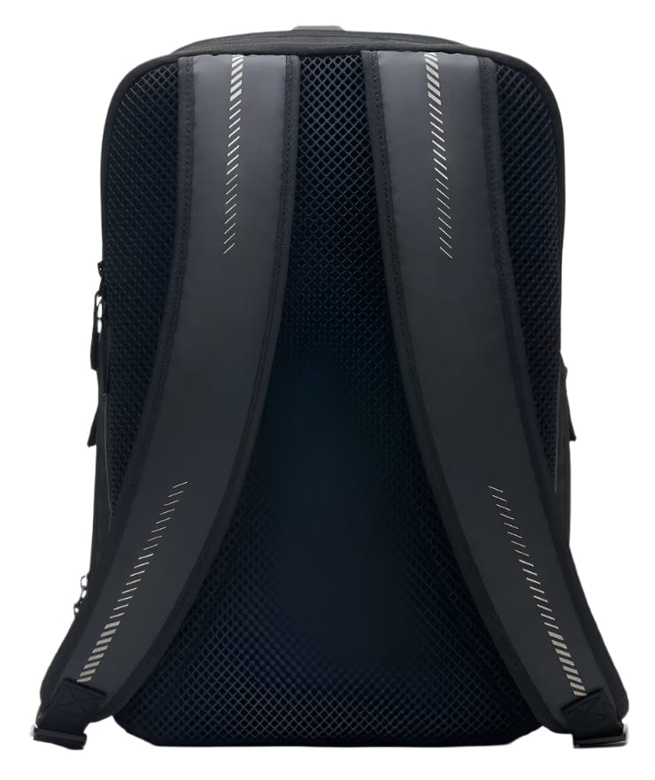 The Kanso Intuko Tennis 23L Backpack in black features padded, mesh-covered shoulder straps with reflective accents. Its ergonomic design ensures comfort and support, while a separate compartment offers organized storage, making it an ideal everyday companion.