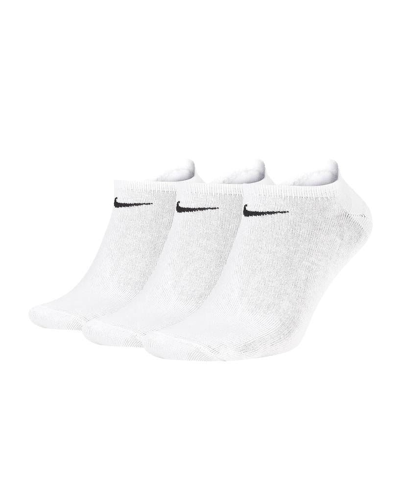 A pack of three Nike Unisex Ankle Socks in white, each displaying a small black swoosh logo. Crafted with sweat-wicking fabric, these socks are neatly arranged against a plain white background.