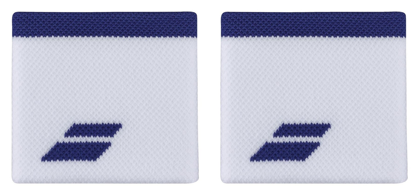 A pair of Babolat Logo Wristbands in white with sodalite blue accents featuring a textured surface and dark blue edging at the top. Each absorbent wristband displays a small blue geometric logo in the lower corner, ideal for keeping you comfortable on the court.