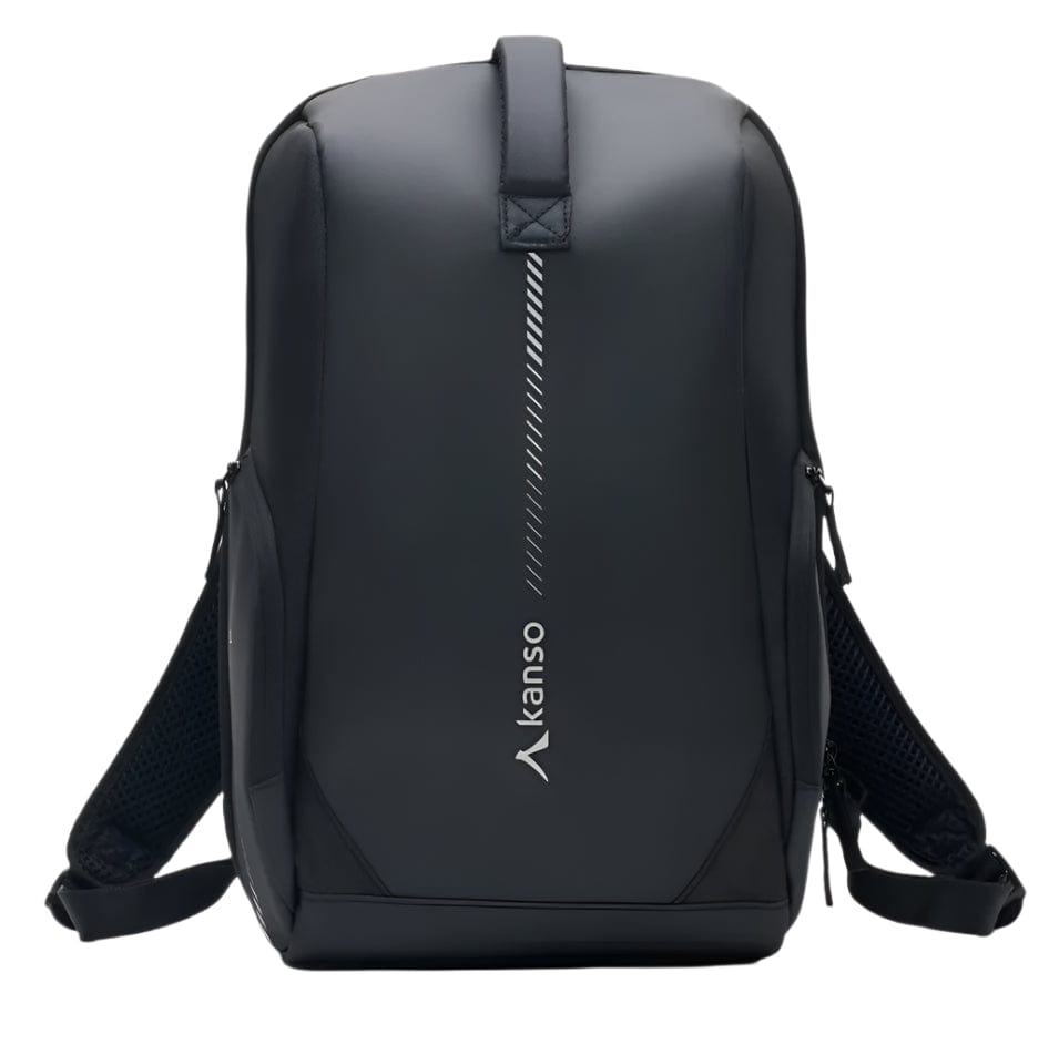 The Kanso Intuko Tennis 23L Backpack in black, perfect for everyday use, showcases a vertical zipper and "kanso" printed near the bottom. It features padded shoulder straps, a top handle, and an extra compartment for organized storage against a plain white backdrop.