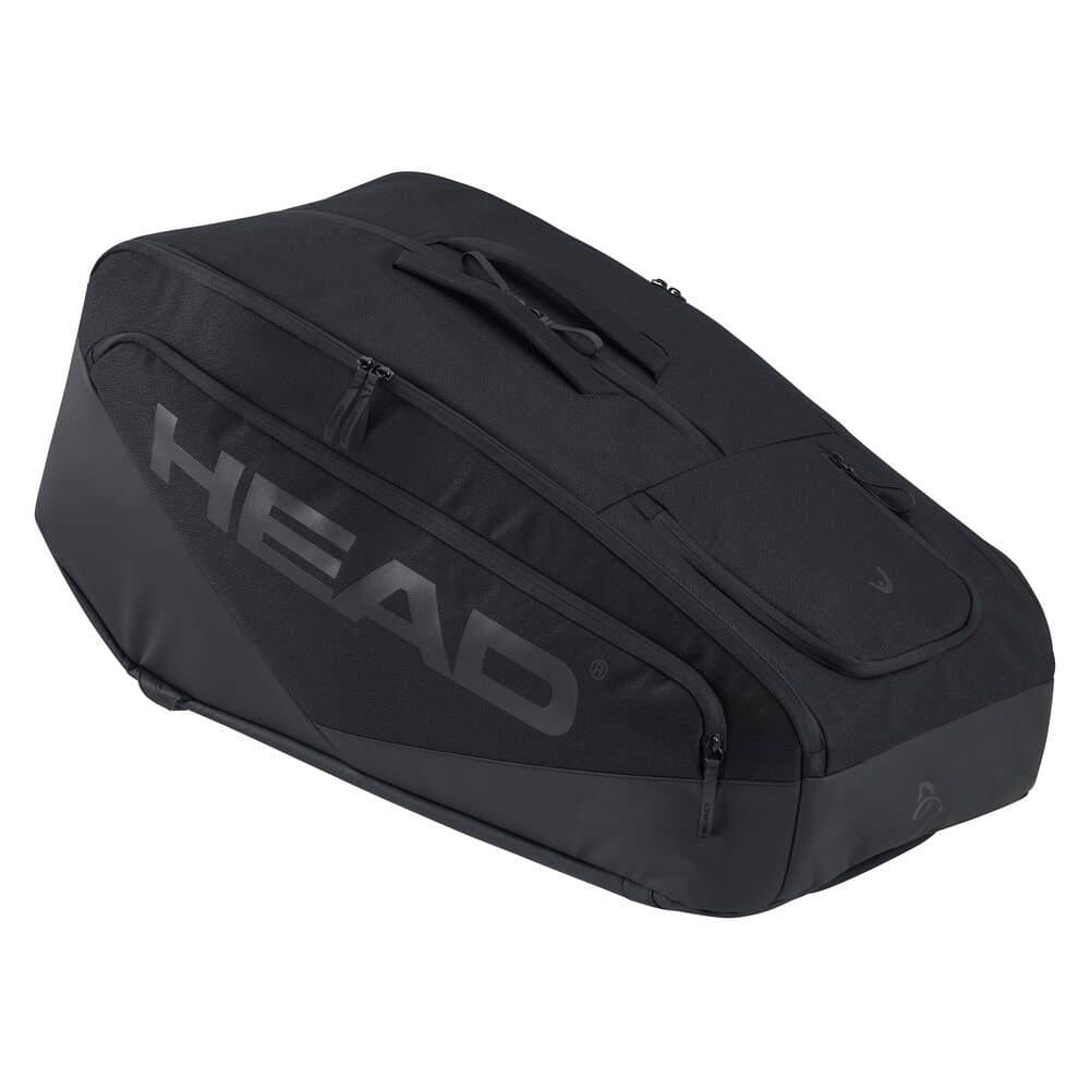 The HEAD Pro X 12 Racket Tennis Racket Bag XL - Black features multiple zippered compartments, sleek Novak Djokovic–inspired design, and bold gray "HEAD" branding on the side.