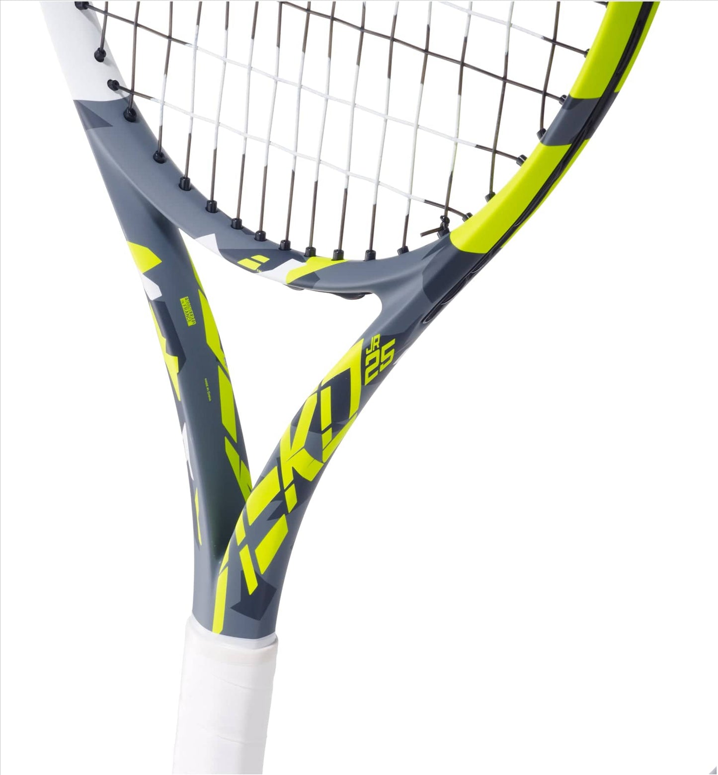 Close-up of a Babolat Aero Junior 25 tennis racket, emphasizing the frame and strings. The design showcases a gray and neon yellow color scheme with "JFKID 25" emblazoned on the side. The handle features a white grip, ideal for young players using junior rackets.