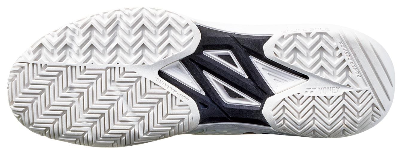 The image features the Yonex Power Cushion Sonicage 2025 Men's Tennis Shoes in white, showcasing a herringbone tread sole with black geometric accents and textured grooves for grip, emphasizing its lightweight Power Cushion technology.
