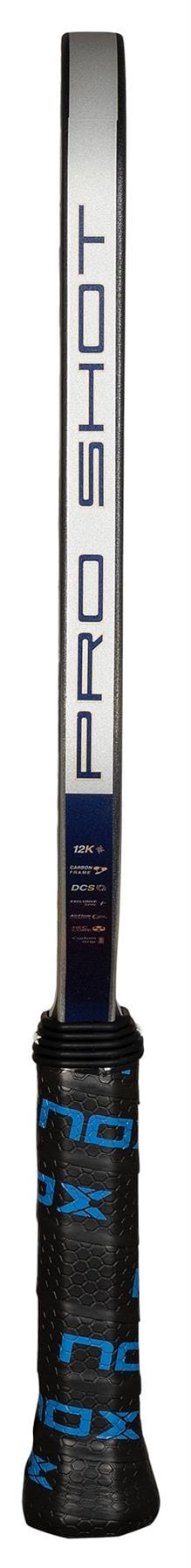 Side view of the NOX Pro Shot Pickleball Paddle handle, featuring "PRO SHOT" on the white shaft and a black grip wrapped in blue-patterned tape, like those on advanced 12K carbon fibre and spin technology paddles from NOX.