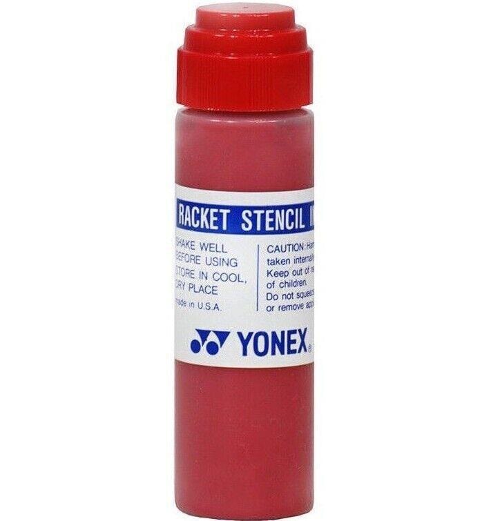 The Yonex Stencil Ink - Red bottle comes with a convenient sponge applicator under its cap. The label recommends shaking well before applying the ink to racket strings and displays important cautionary information. It is proudly made in the USA.