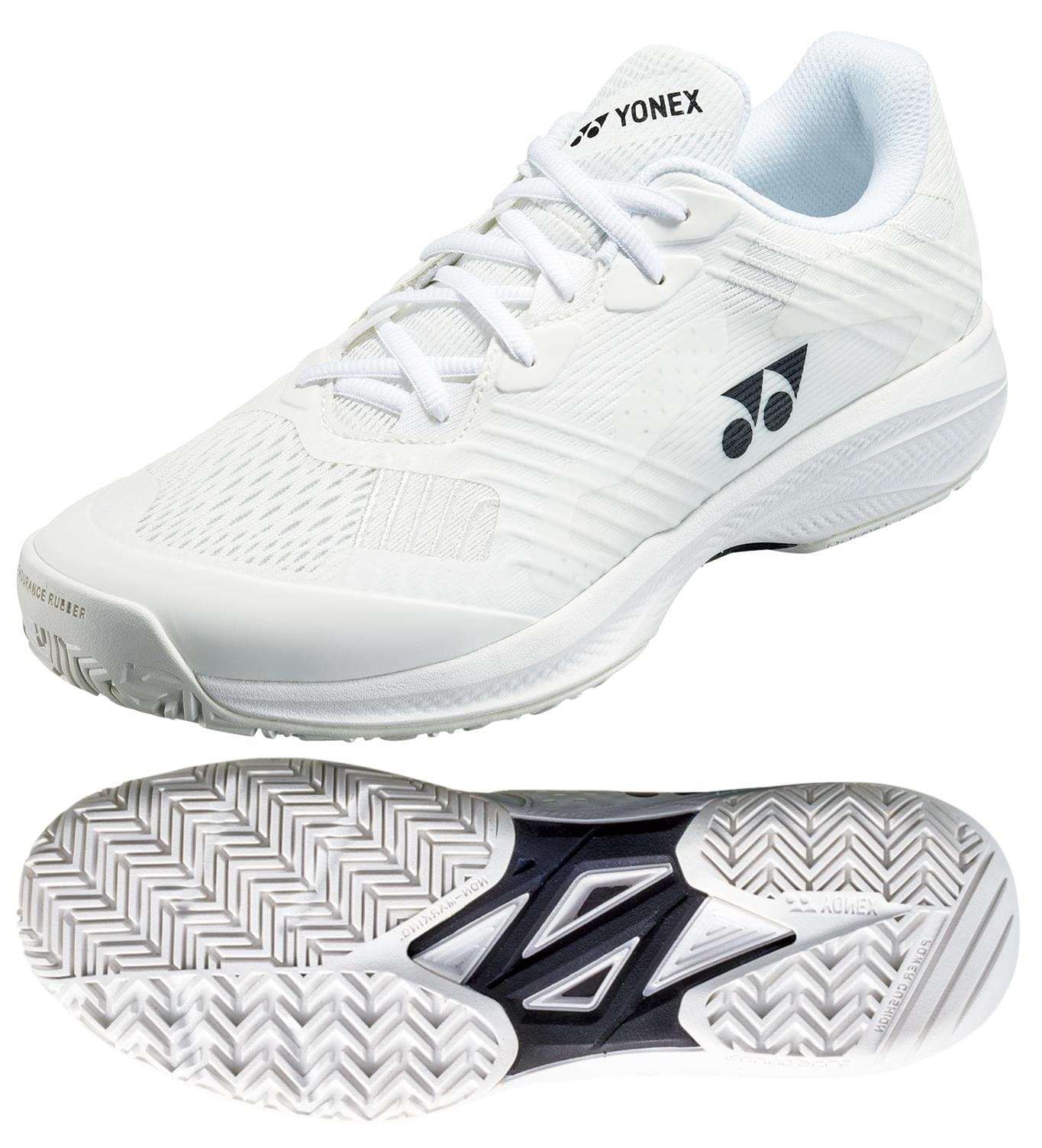 The Yonex Power Cushion Sonicage 2025 Men's Tennis Shoes in white are shown from two angles. They feature a textured upper with the Yonex logo, a herringbone-patterned sole with black inset for grip, and Power Cushion technology for lightweight comfort and stability.