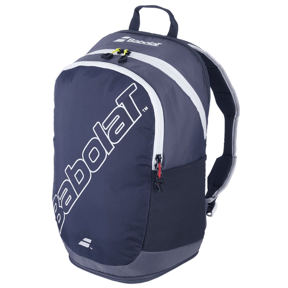 The Babolat Evo Court Tennis Backpack in grey and blue boasts a large front pocket, a smaller zippered top compartment, and dedicated racket storage. The brand logo stands out prominently in white on the front. Crafted from eco-friendly material, it features adjustable straps and a top handle for easy carrying.