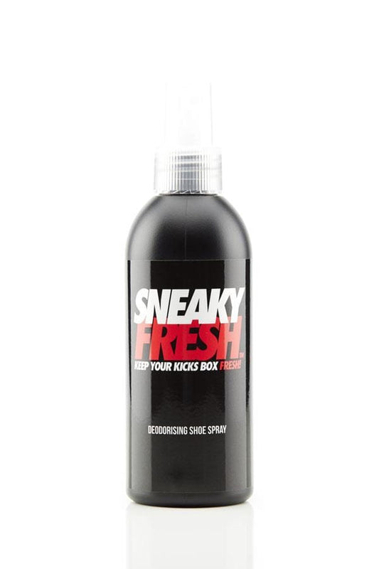 A black pump bottle of Sneaky Fresh Shoe Deodorant by Sneaky, adorned with a white cap. The label displays bold white and red text, "Sneaky Fresh: Keep Your Kicks Box Fresh!" on a simple white background, effectively removing odors to maintain your footwear's pristine condition.