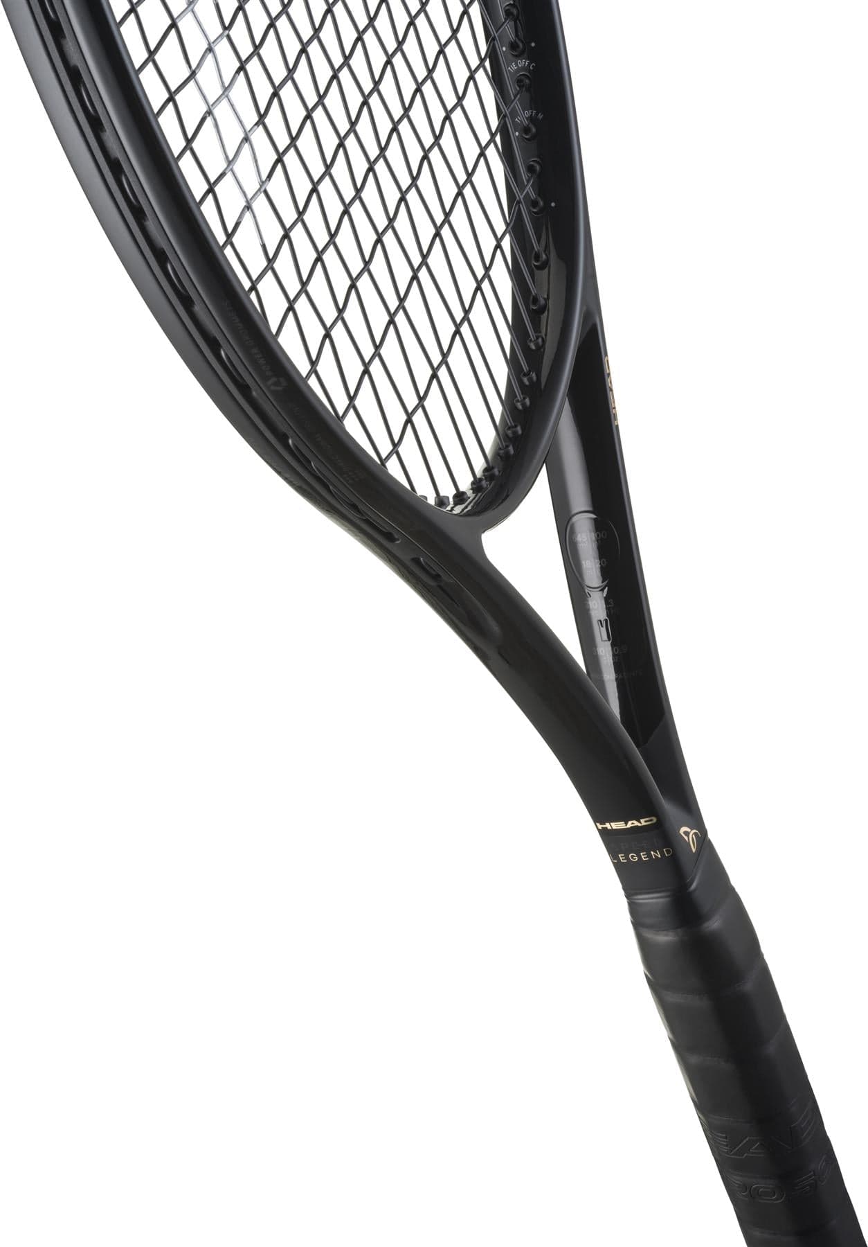 Close-up of the HEAD Speed Pro Legend 2025 Tennis Racket - Black / Gold by HEAD, highlighting its strings, frame, and grip, shown diagonally against a white background.