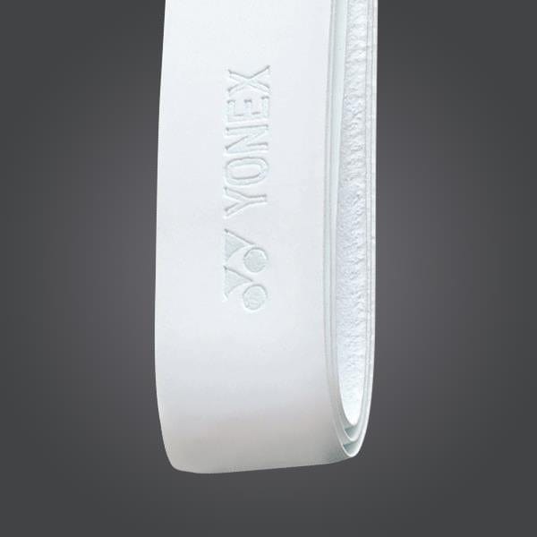 A close-up of a white Yonex AC126EX Replacement Synthetic Leather Grip against a dark background. The logo and brand "Yonex" are embossed on the synthetic leather material, which features a textured surface for improved handling.