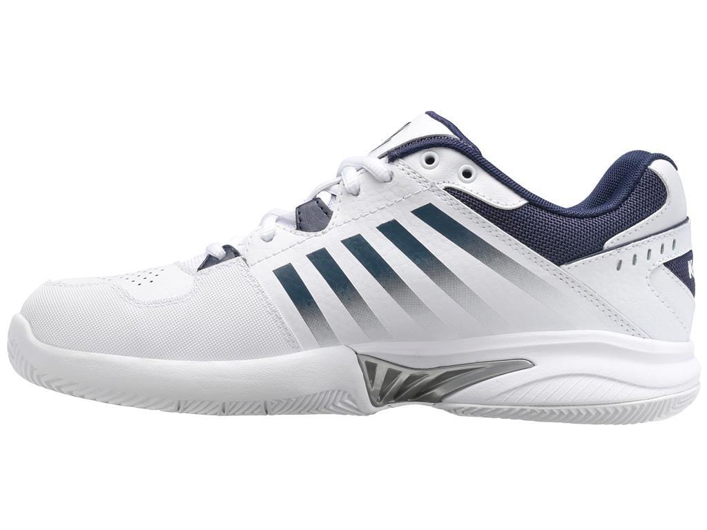 The K-Swiss Receiver V Men's Tennis Shoes in white, peacoat, and silver showcase a white athletic design with dark blue accents, including a gradient of gray stripes on the sides. They feature a blue interior lining and a thick white sole with textured tread. Perfect for sports or casual wear, these shoes deliver excellent performance and cushioning.
