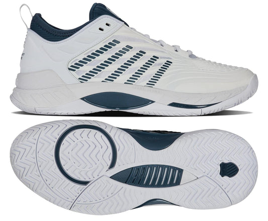 The K-Swiss Hypercourt Supreme 2 Men's Tennis Shoes in White/Stargazer feature DuraWrap X for durability and striped side details. They have a cushioned sole with DragGuard 7.0 for traction, and showcase a side profile and circular grip pattern.