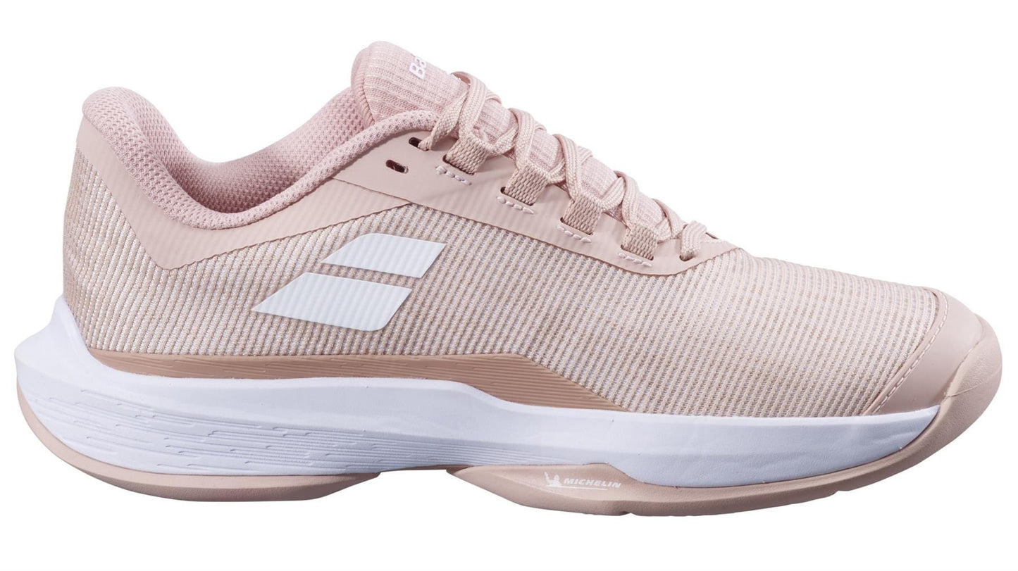 Introducing the Babolat Jet Tere 2 All Court 2025 Women's Tennis Shoes in Evening Sand, an ultra-lightweight option with a sleek design for comfort and stability. Featuring a light pink upper, white accents, and a white sole with subtle pink detailing.