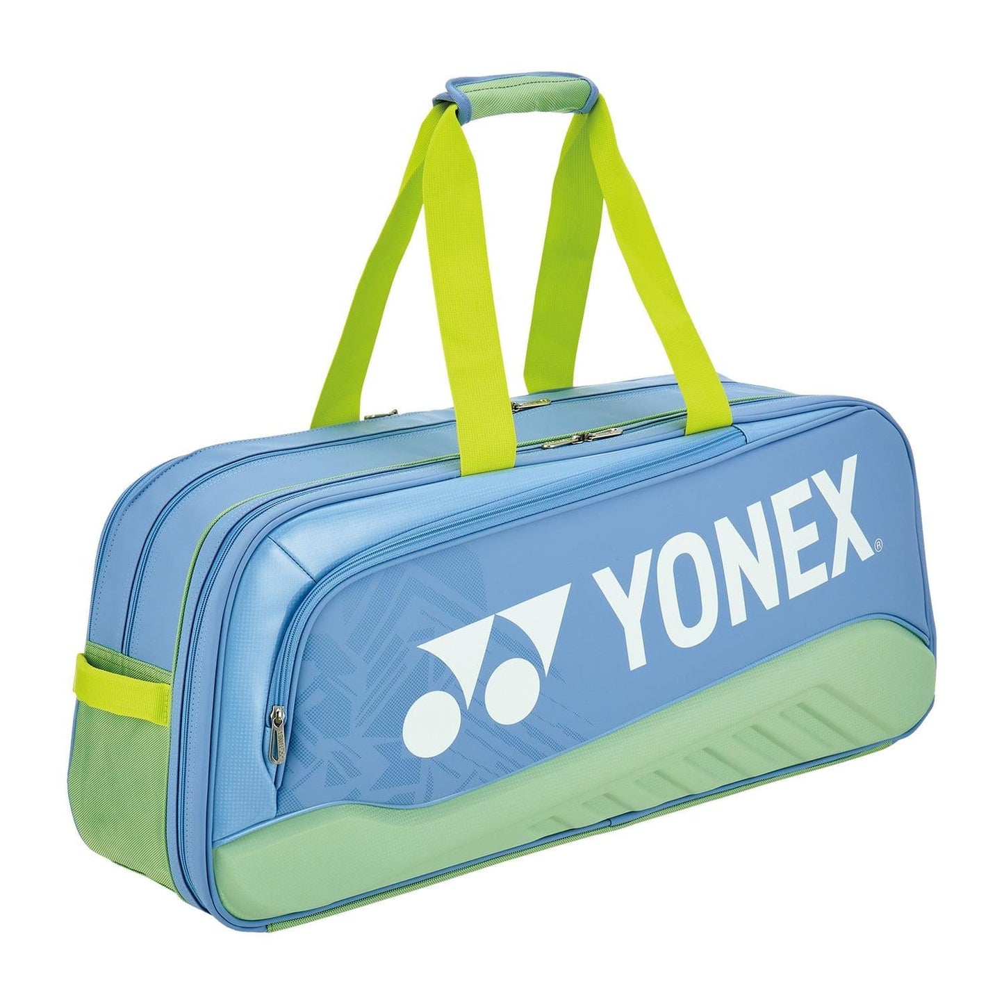 The Yonex 02531WEX Expert Tournament Tennis Bag in smoke blue features a sleek rectangular design with bold white branding and green accents, two zippered compartments, a side pocket, and a shoe pocket to accommodate all your sports equipment needs.