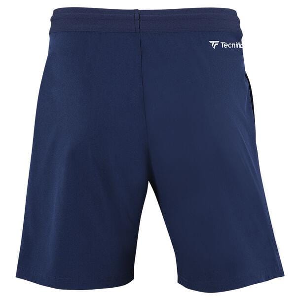 The Tecnifibre Mens Team Tennis Short - Marine, branded by Tecnifibre, is designed with a polyester blend in navy blue. It features an elasticated waistband for enhanced comfort, optimum ventilation, and a small white Tecnifibre logo on the upper left side. The shorts are displayed from the back.