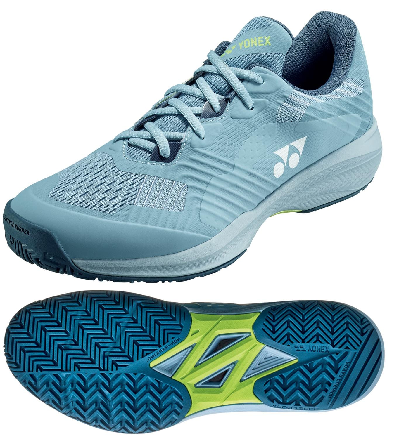 The Yonex Power Cushion Sonicage WIDE 2025 men's tennis shoes, in grayish blue, showcase white accents with a yellow side logo. Designed for lightweight action, these lace-up shoes have a textured sole featuring a green and blue pattern for traction and include Power Cushion technology with a branded tongue.