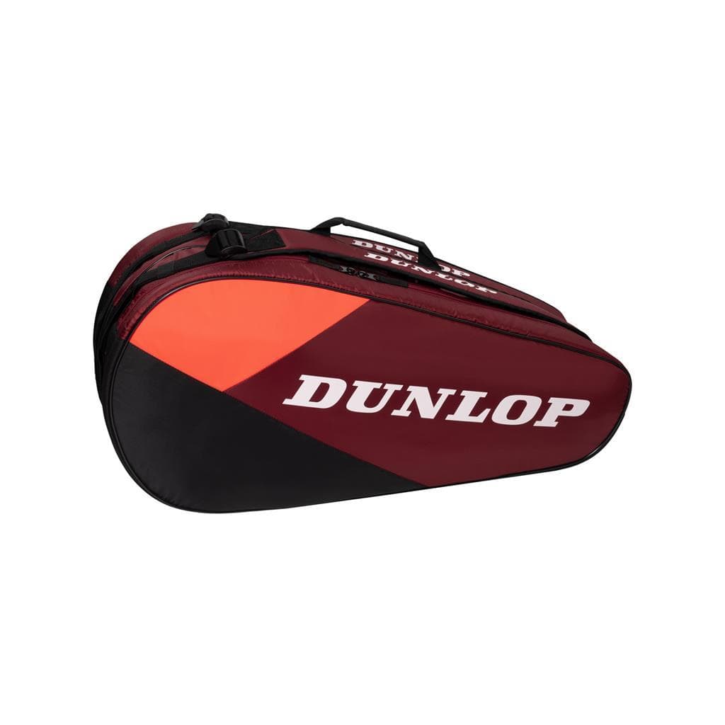 A spacious Dunlop CX Club 10 Tennis Racket Bag in black and red, featuring "DUNLOP" in white on the side. The bag includes multiple compartments and a convenient carrying handle.
