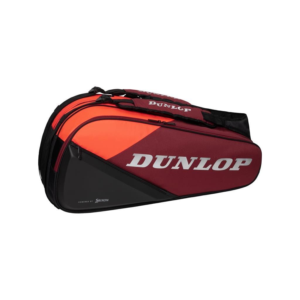 The Dunlop CX Performance 8 Tennis Racket Bag - Black / Red offers multiple compartments and ergonomic shoulder straps for easy carrying, with the brand name "Dunlop" prominently displayed in bold white letters, ensuring both style and functionality.
