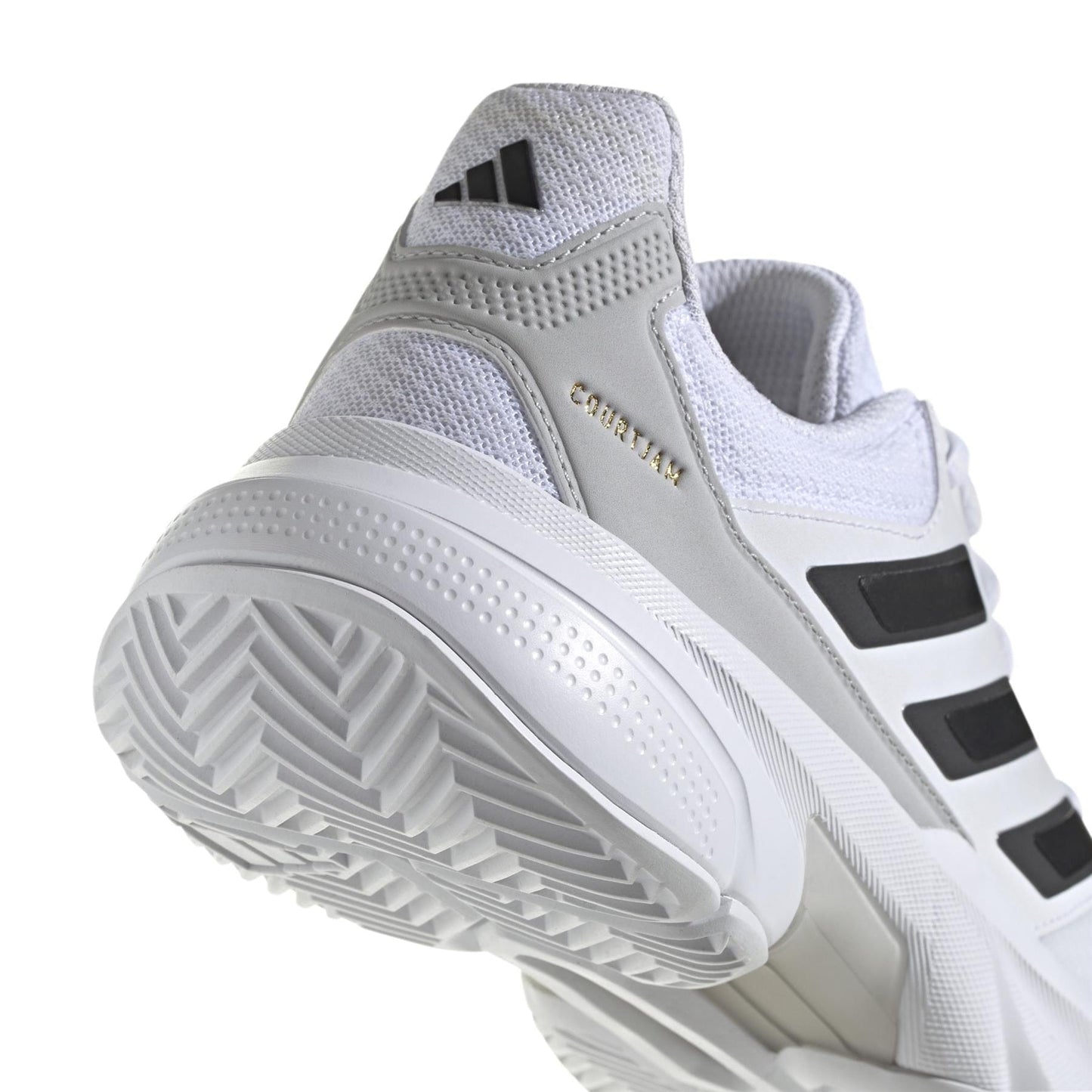 Close-up of the ADIDAS CourtJam Control 3 Mens Tennis Shoe in white featuring black stripes, a textured tread, side and heel branding, and a Bounce midsole for enhanced comfort.