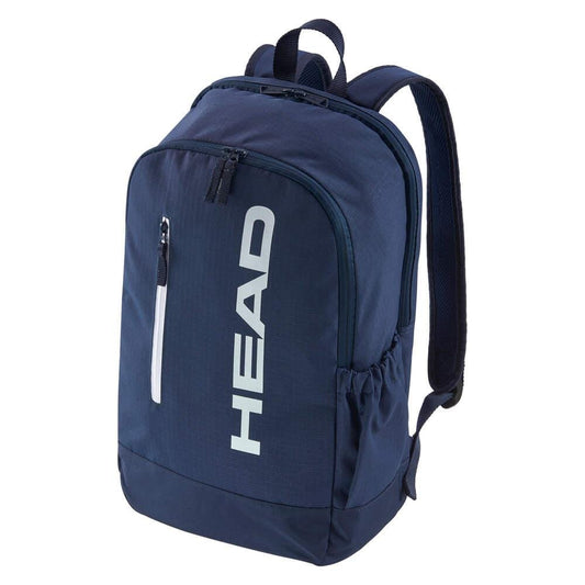 The HEAD BASE Tennis Backpack 17L - Navy by HEAD offers a fresh design with a racket compartment, front zip pocket, bold vertical "HEAD" logo, padded shoulder straps, and handy side pockets.