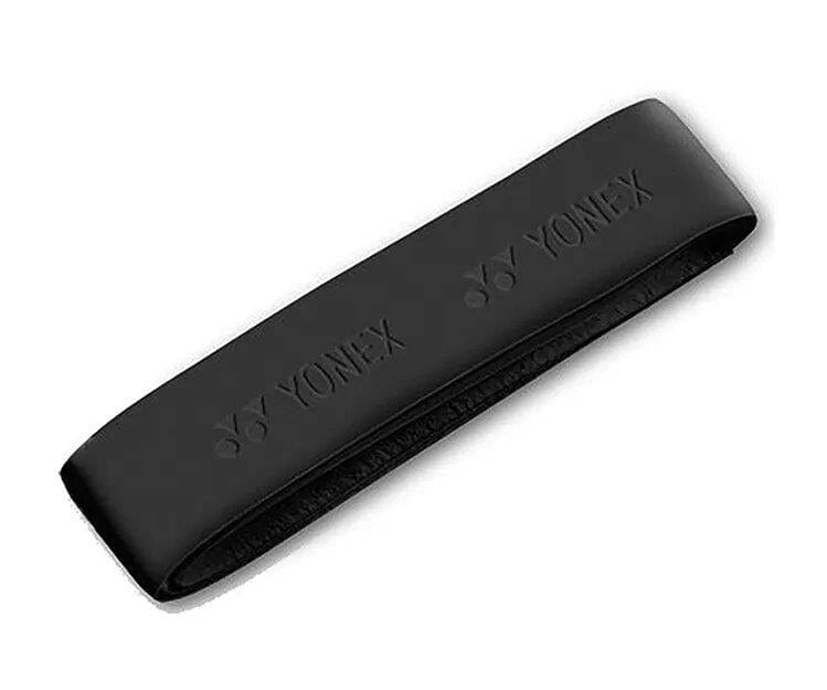 Close-up of a black Yonex AC126EX Replacement Synthetic Leather Grip, crafted from high-quality synthetic material, with the brand logo embossed on it. The grip is laid flat on a plain white background.
